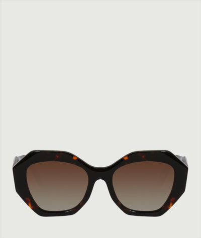 Oversized butterfly shape sunglasses with tortoise shell print frame and brown lenses.